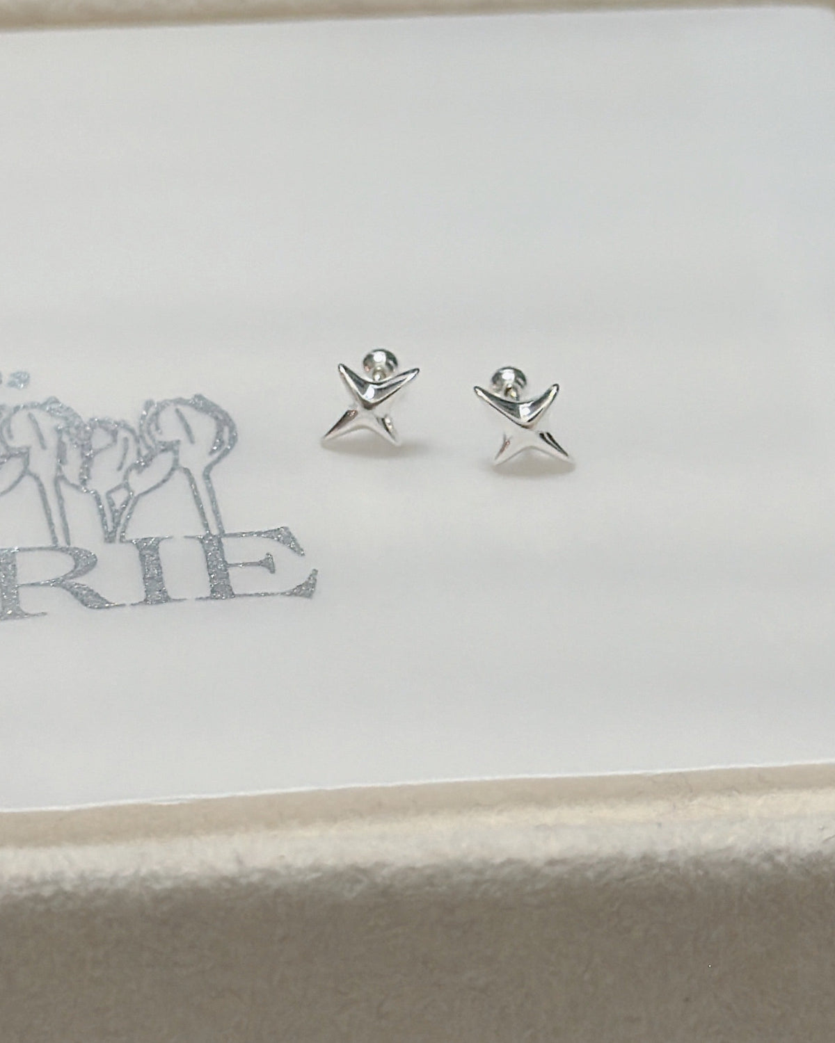 #668 | Cross Star Piercing - Screw-back | 925 Silver