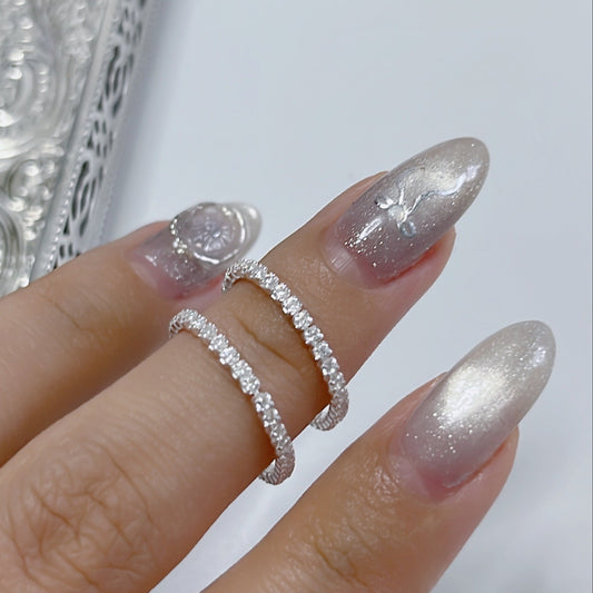 Discover the R83 1.5mm CZ Tennis Chain Ring in premium 925 silver. Delicate chain-inspired band lined with sparkling cubic zirconia stones offers timeless elegance and subtle iced-out glamour for everyday sophistication.

#R83Ring #CZTenisRing #925SilverJewelry #TennisChainRing #CubicZirconiaRing #FashionJewelry #IcedOutRing #SilverBand #LuxuryAccessories #ElegantRing

#R83戒指 #CZ網球鏈戒 #925銀飾 #網球鏈戒指 #鋯石戒指 #時尚珠寶 #鑲鑽戒 #銀細環 #聖誕禮物 #優雅戒指