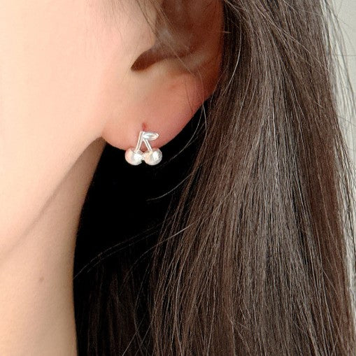 Indulge in playful charm with E43 Cherry Earrings, exquisitely crafted in 925 silver. This Korea-inspired accessory features dainty cherry drops, blending cute and chic for daily wear or gifting. Hypoallergenic, lightweight, and radiant—add a fruity pop of elegance to any look with timeless sophistication.

#SilverEarrings, #925SterlingSilver, #SterlingSilverEarrings, #SilverJewelry, #HandmadeEarrings, #StatementEarrings, #EarringStyle, #MinimalistEarrings, #FashionJewelry, #JewelryAddict