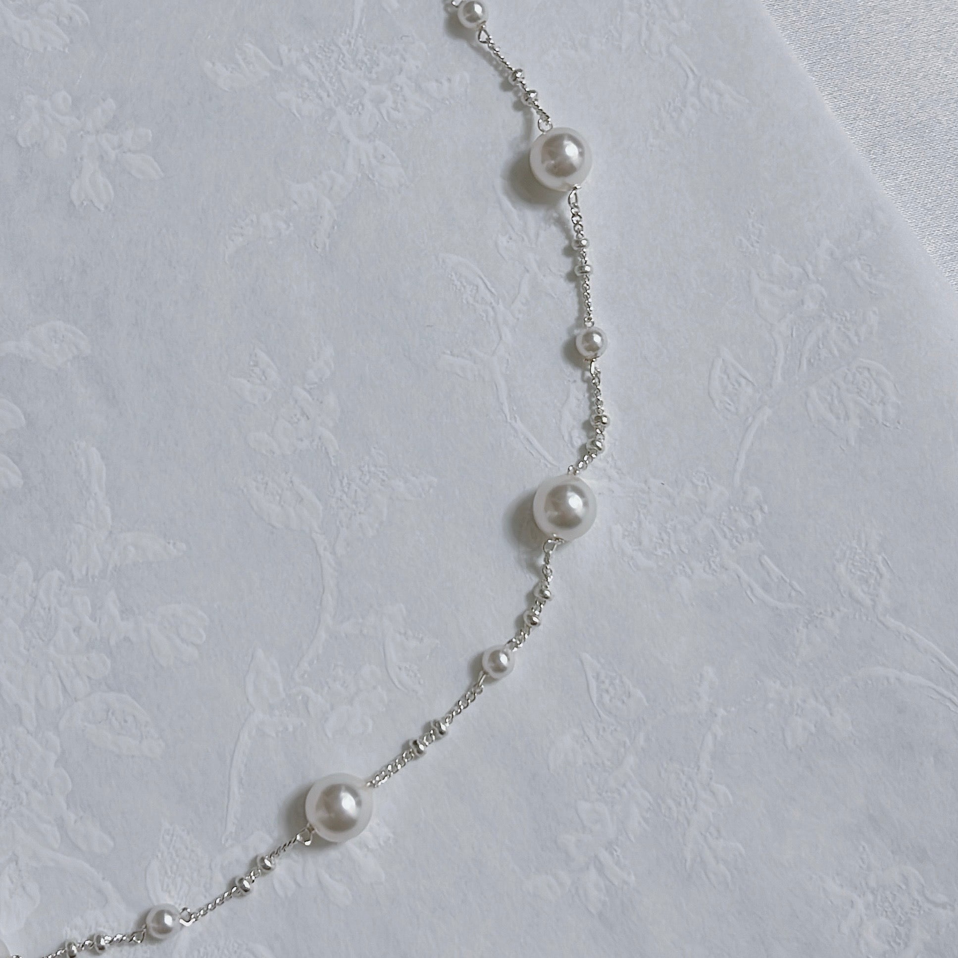 Discover the enchanting N39 Pearl and Star Necklace in premium 925 silver. Lustrous freshwater pearls mingle with celestial star pendants, blending ethereal elegance and timeless charm for everyday sophistication and starry glamour.
#N39Necklace #PearlStarNecklace #925SilverJewelry #PearlPendant #StarNecklace #FashionJewelry #CelestialJewelry #SilverNecklace #LuxuryAccessories #ElegantNecklace
#N39項鍊 #珍珠星星項鍊 #925銀飾 #珍珠吊墜 #星星項鍊 #時尚珠寶 #天體飾品 #銀項鍊 #奢華配件 #優雅項鍊