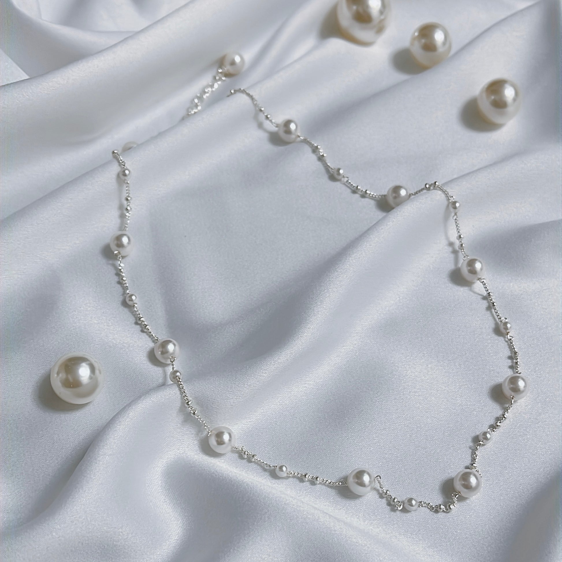 Discover the enchanting N39 Pearl and Star Necklace in premium 925 silver. Lustrous freshwater pearls mingle with celestial star pendants, blending ethereal elegance and timeless charm for everyday sophistication and starry glamour.

#N39Necklace #PearlStarNecklace #925SilverJewelry #PearlPendant #StarNecklace #FashionJewelry #CelestialJewelry #SilverNecklace #LuxuryAccessories #ElegantNecklace

#N39項鍊 #珍珠星星項鍊 #925銀飾 #珍珠吊墜 #星星項鍊 #時尚珠寶 #天體飾品 #銀項鍊 #奢華配件 #優雅項鍊